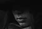 grayscale photo of person's lips